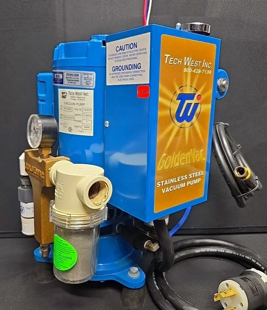 Vacuum pump removed and prepared for resale